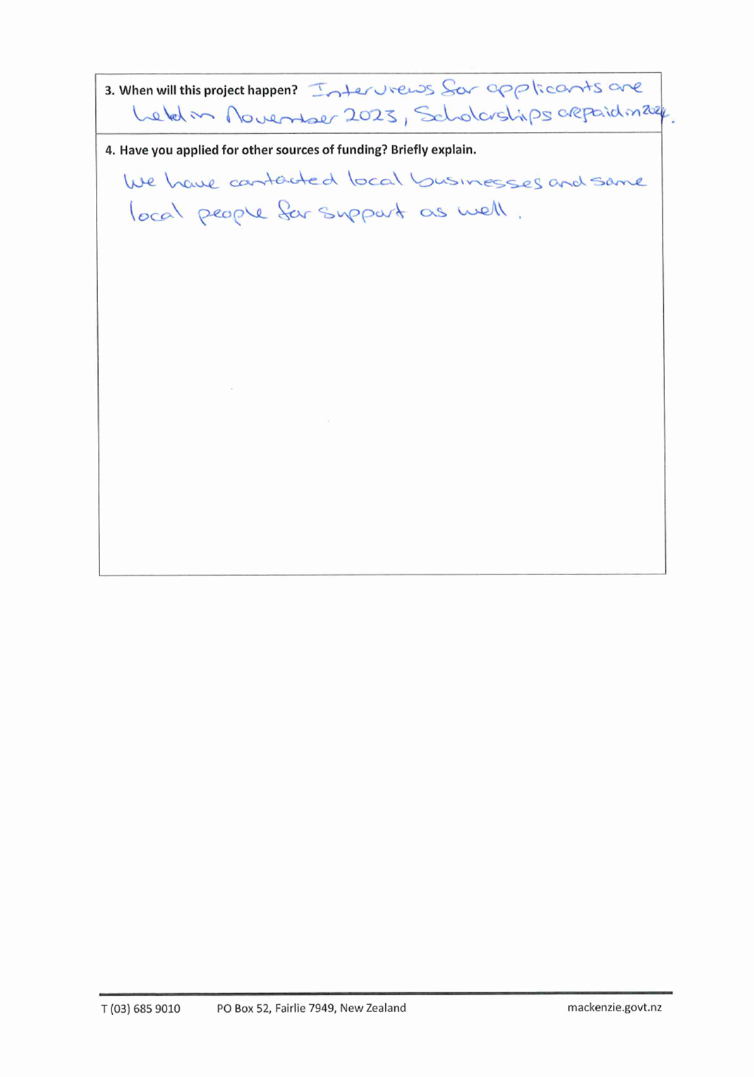 A white piece of paper with blue writing

Description automatically generated