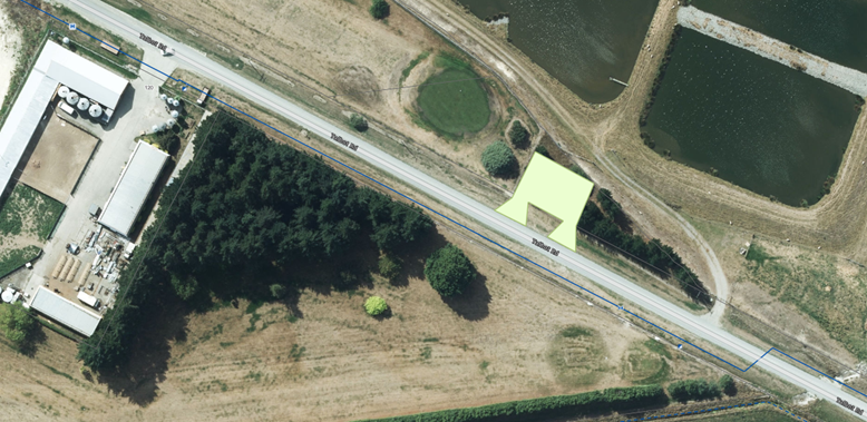 An aerial view of a road

Description automatically generated